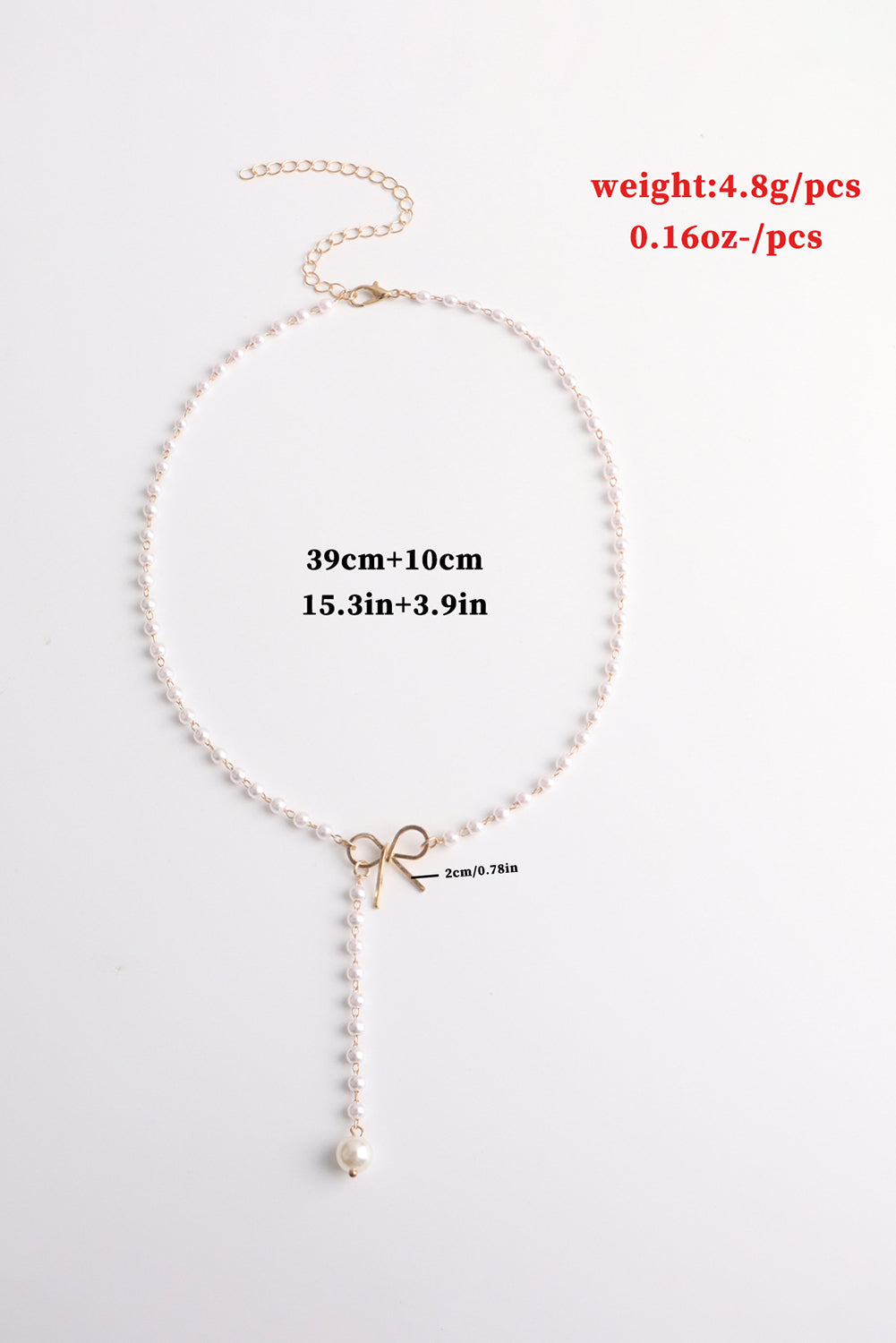Collar con cadena de perlas y lazo chapado